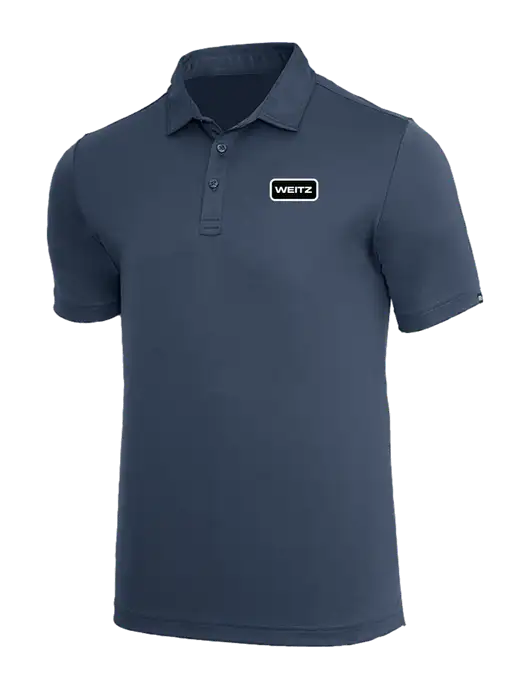 TravisMathew Dark Slate Blue Coto Performance Polo w/Weitz Logo